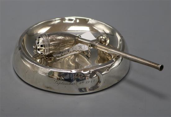 A 19th century French white metal pipe and a silver dish/ashtray.